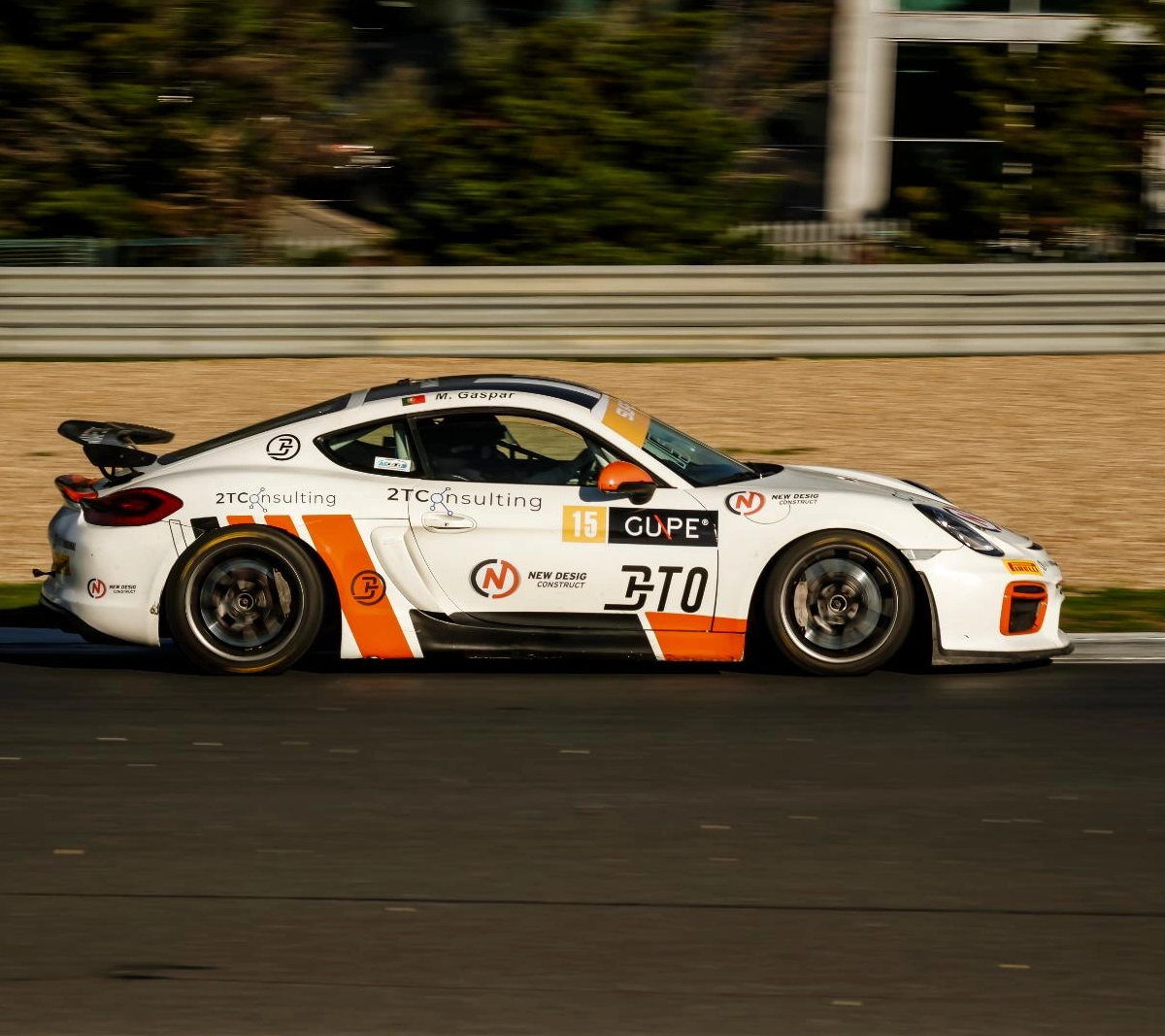 Miguel Gaspar racing a Porsche GT4 on track