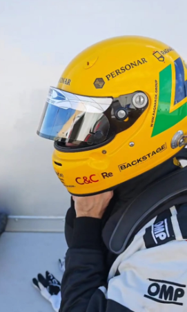 Miguel Gaspar helmet with C&C Re, Personar and Backstage branding